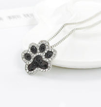 Load image into Gallery viewer, Paw Print Black and Clear Stone Necklace