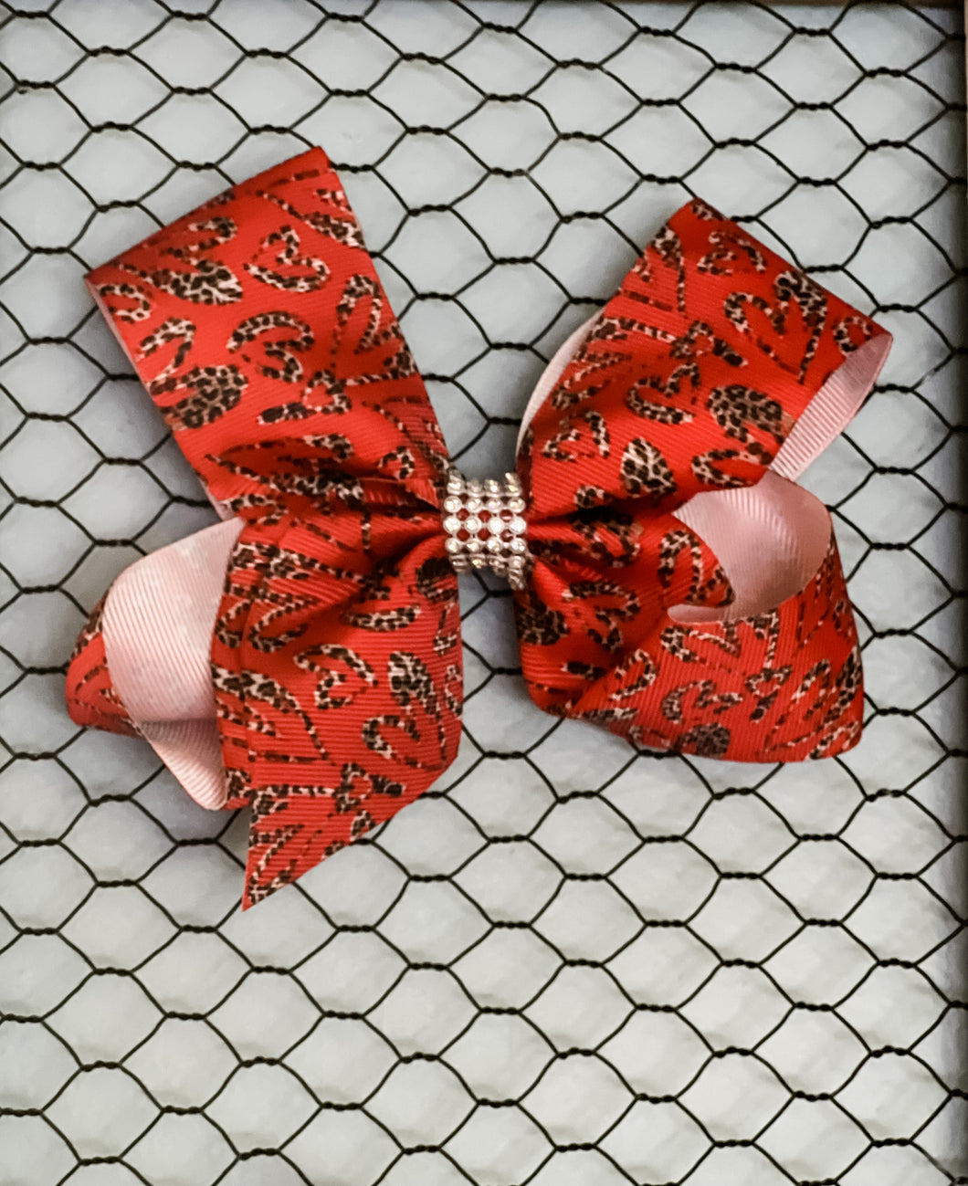 Red Hair Bow With Leopard Print Hearts and Rhinestone Center